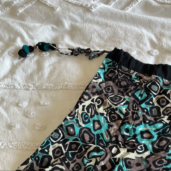 Flared Oversized Pants Bottoms with Button Closure Tassles Drawstring Waistband - Picture 3 of 8